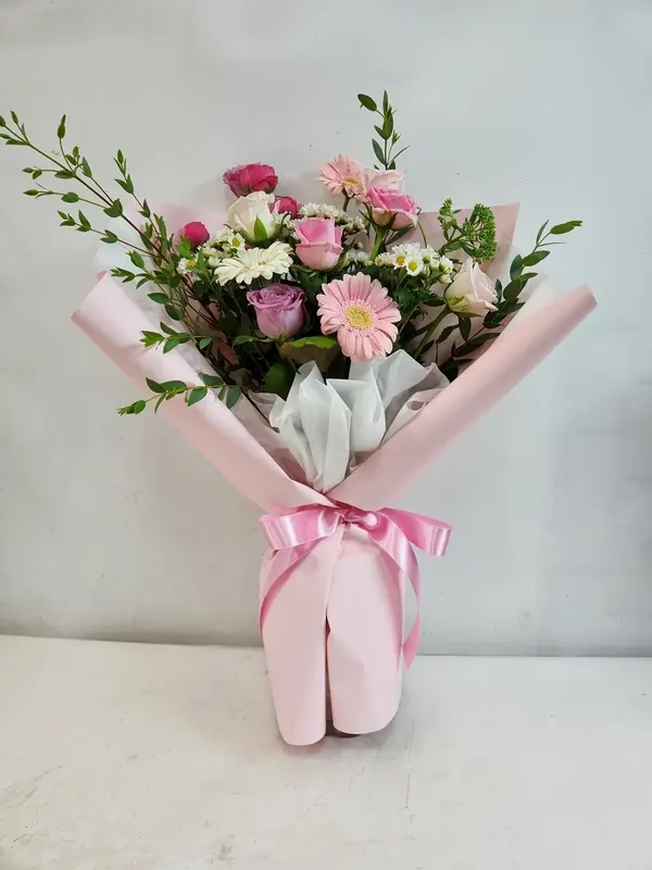 How the colour of a flower wrap changes the message — a real delivery photo from Arrive in Bloom