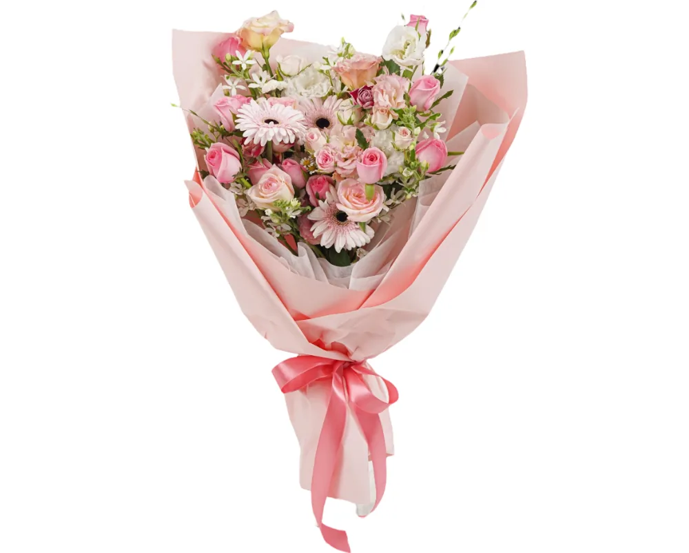 Bouquet of pink roses, pink gerberas, lisianthus and white fillers in a pink wrap tied with a coral ribbon